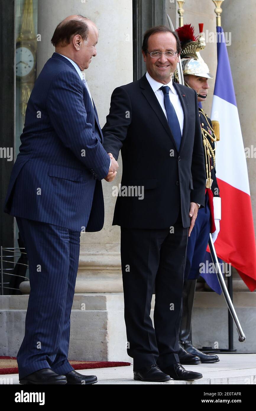 President Francois Hollande escorts his Yemeni counterpart Abd Rabbo Mansour Hadi following a meeting at the Elysee Presidential Palace, in Paris, France, on October 4, 2012. Photo by Stephane Lemouton/ABACAPRESS.COM. Stock Photo