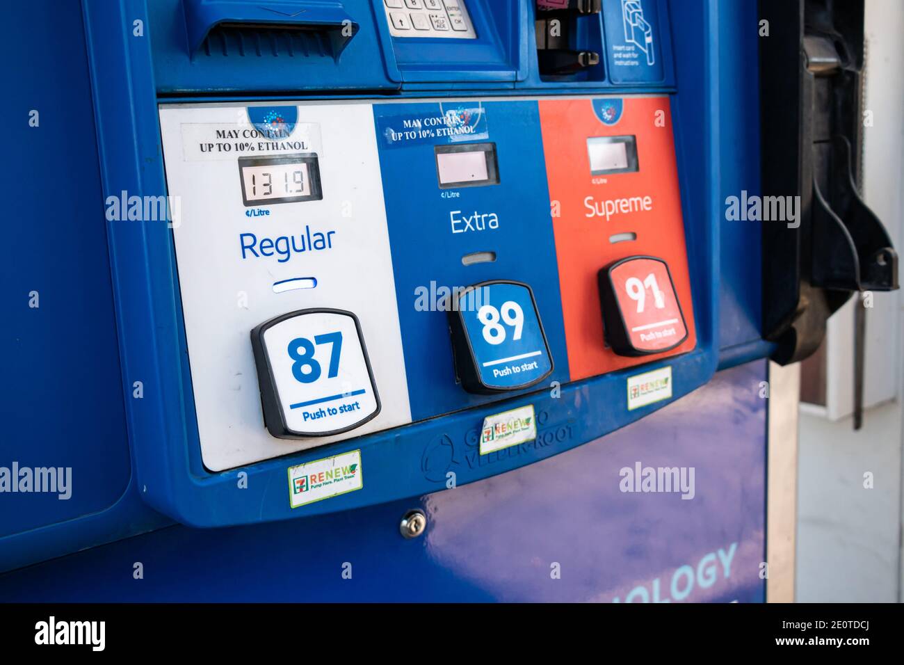 Vancouver, Canada - July 13,2020: A rack with pumps with different types of fuel at  Esso Gas Station. Stock Photo