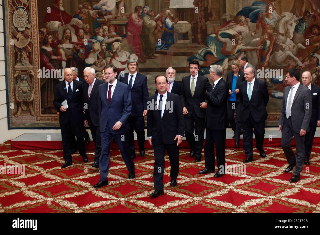 (From L to R French Foreign Affairs Minister Laurent Fabius, Spanish Minister of Foreign Affairs Jose Manuel Garcia Margallo, Spanish Prime Minister Mariano Rajoy, French President Francois Hollande, French Prime Minister, Jean-Marc Ayrault, Spanish Interior Minister, Jorge Fernandez Diaz and French Interior Minister Manuel Valls, French Junior Minister for Transports and Maritime Economy, Frederic Cuvillier, Spanish Minister of Development, Ana Pastor Julian, French Agriculture Minister, Stephane Le Foll, Spanish Agriculture and Environment Minister, Miguel Arias Canete, Spanish Minister of I Stock Photo