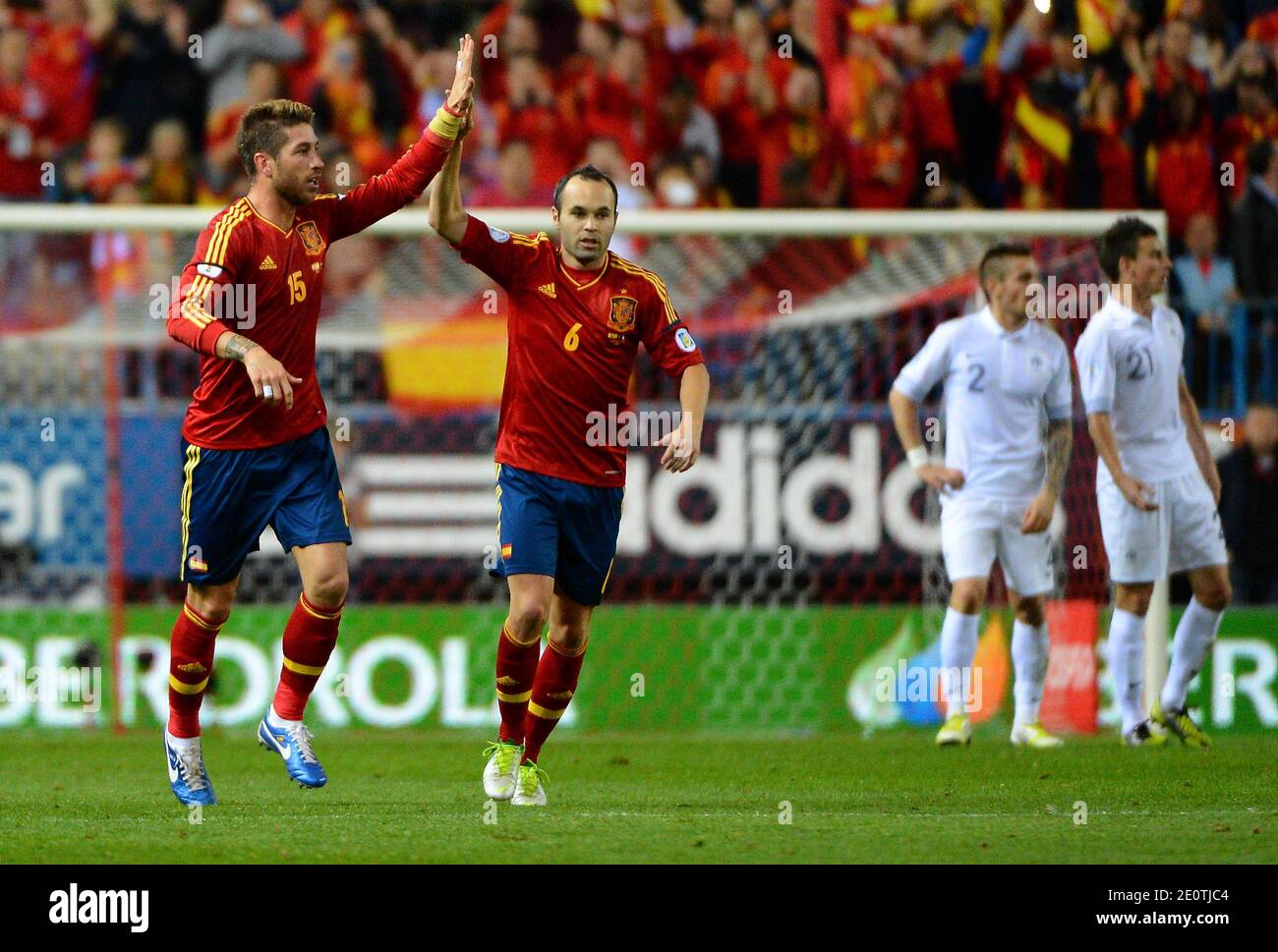 Spain's Sergio Ramos celebrates with Andres Iniesta after scoring the first goal during the World Cup 2014 qualifying soccer match, Spain Vs France at Vicente Calderon stadium in Madrid, Spain on October 16, 2012. The match ended in a 1-1 draw. Photo by Christian Liewig/ABACAPRESS.COM Stock Photo
