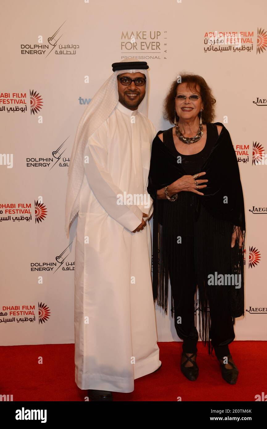 Italian actress Claudia Cardinale poses with Festival Director Ali Al Jabri prior to the screening of Manoel de Oliveira's 'Gebo And The Shadow' 6th Abu Dhabi Film Festival in Abu Dhabi, in United Arab Emirates, on October 18, 2012. Photo by Ammar Abd Rabbo/ABACAPRESS.COM Stock Photo