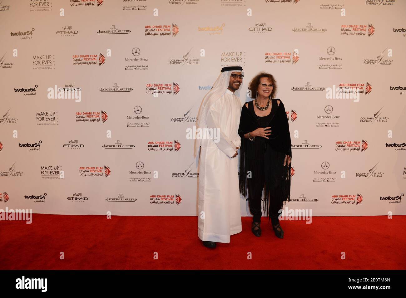 Italian actress Claudia Cardinale poses with Festival Director Ali Al Jabri prior to the screening of Manoel de Oliveira's 'Gebo And The Shadow' 6th Abu Dhabi Film Festival in Abu Dhabi, in United Arab Emirates, on October 18, 2012. Photo by Ammar Abd Rabbo/ABACAPRESS.COM Stock Photo