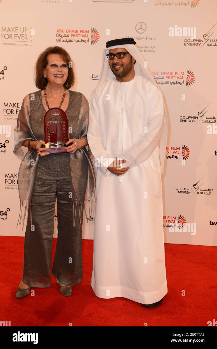 L-R : Italian actress Claudia Cardinale wins a prize for her career, and Festival director Ali Al Jabri at the closing ceremony of at 6th Abu Dhabi Film Festival in Abu Dhabi, United Arab Emirates on October 19, 2012. Photo by Ammar Abd Rabbo/ABACAPRESS.COM Stock Photo