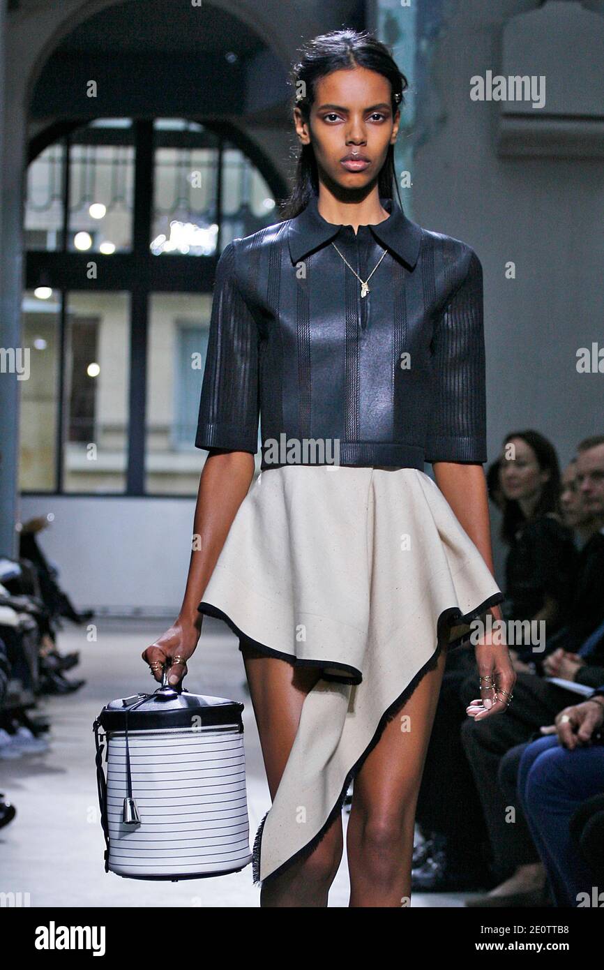 A model displays a creation by French fashion designer Nicolas Ghesquiere  for Balenciaga Spring-Summer 2013 Ready-To-Wear collection show held at  Balenciaga headquarters in Paris, France, on September 27 2012. Photo by  Alain