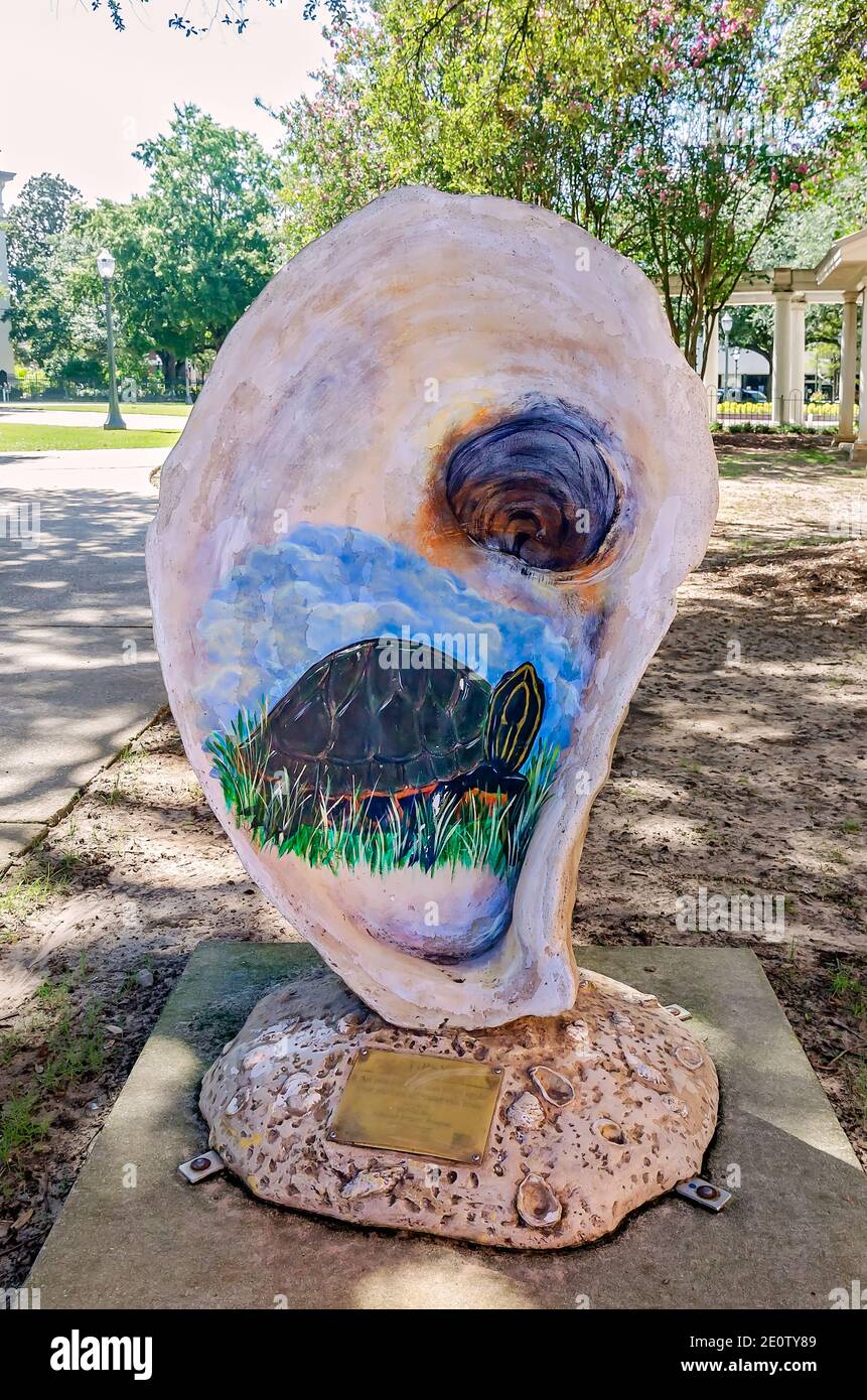 A painted fiberglass oyster stands near Cathedral Square in downtown Mobile, Aug. 9, 2017, in Mobile, Alabama. Stock Photo