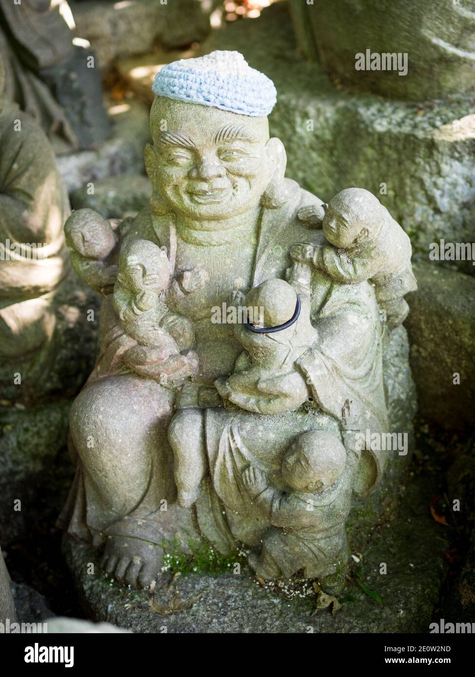 Statues of the original followers of Buddha (called Shaka Nyorai in Japan), with knitted caps at Daisho-in Temple (Daishoin Temple), Miyajima, Japan. Stock Photo