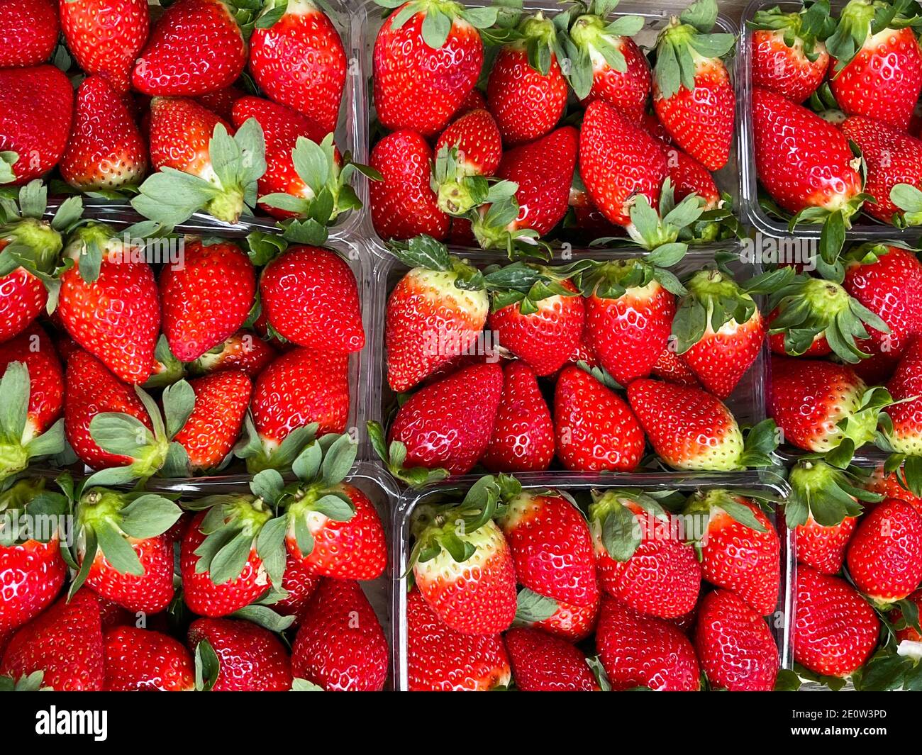 Many ripe red strawberries close up for sale Stock Photo - Alamy