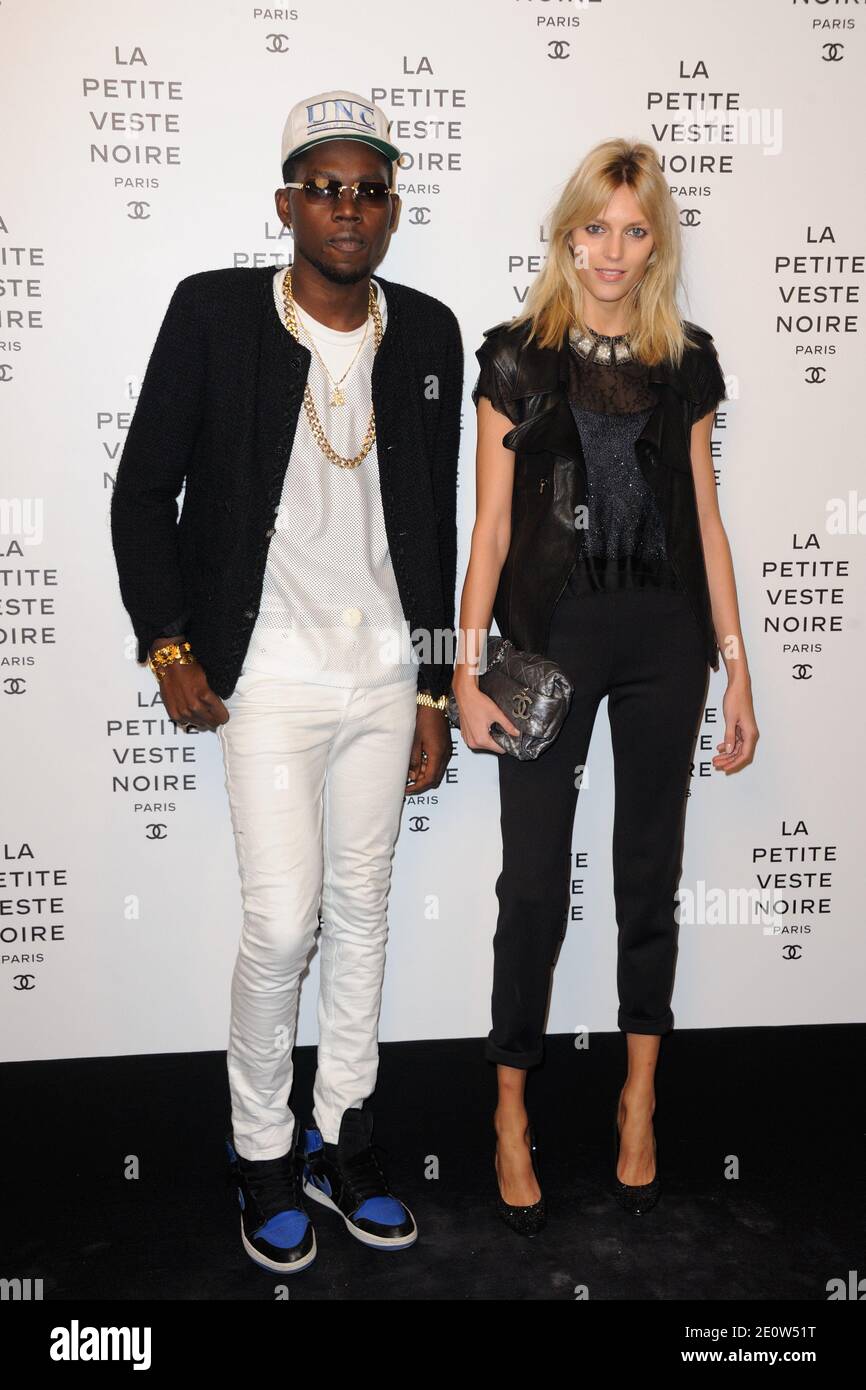 Theophilus London and Anja Rubik attending Chanel's 'La Petite Veste Noire'  (The Little Black Jacket) exhibition