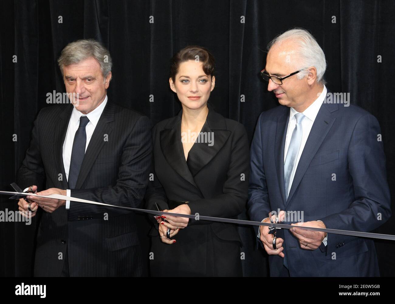 L-R) Sidney Toledano CEO of Christian Dior, Marion Cotillard and Paolo de  Cesare attending the launching of the news Christmas Illuminations of Dior  at le Printemps Haussman in Paris, France on November