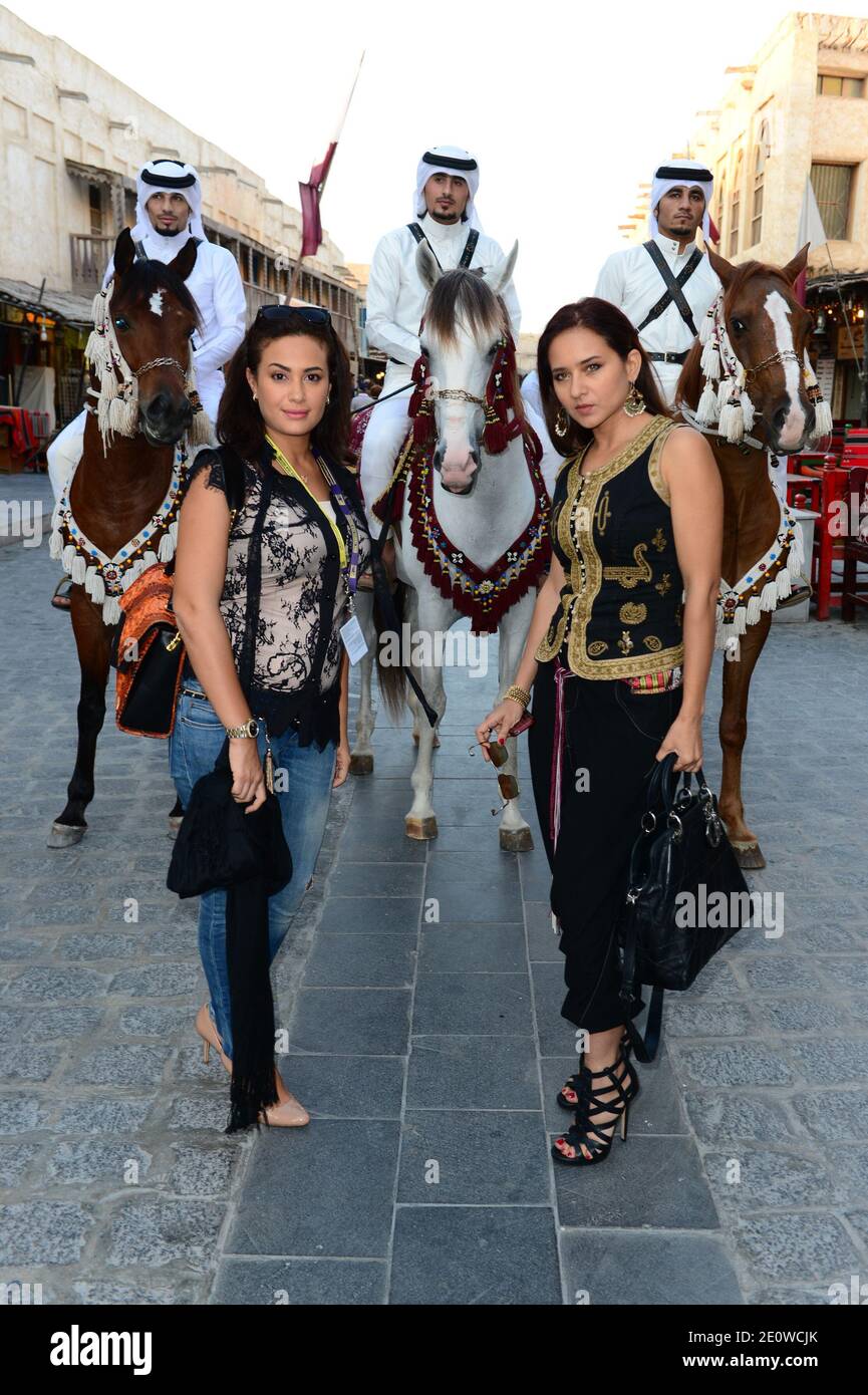 Tunisian actress Hend Sabri and Egyptian actress Nelly Kareem (right) pose as they attends the 4th Doha TriBeCa Film Festival in old Souk Waqif in Doha, Qatar on November 18, 2012. Photo by Ammar Abd Rabbo/ABACAPRESS.COM Stock Photo