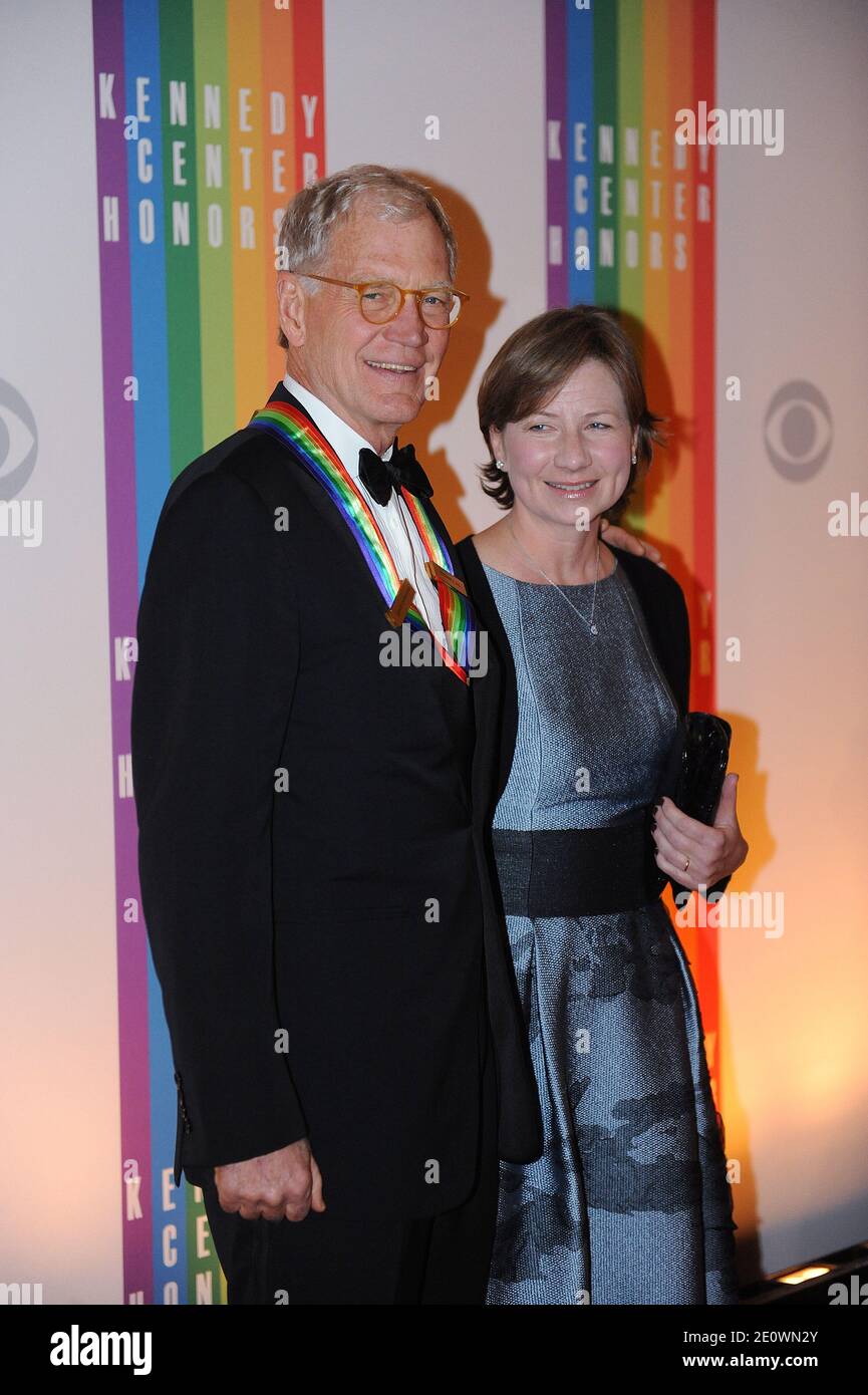 Regina Lasko and David Letterman pose for photographers during the 35th