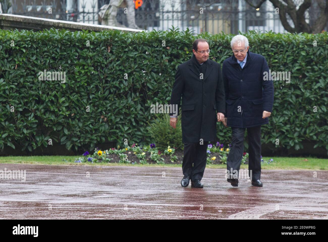 French President Francois Hollande and Italian Prime Minister Mario Monti review the guard of honor prior to the 30th France-Italy annual Summit held in Lyon, France on December 3, 2012. The two countries are meeting to sign an agreement for the construction of new high speed (TAV) rail line running from Lyon, France to Turin, Italy. Photos by Vincent Dargent/ABACAPRESS.COM Stock Photo