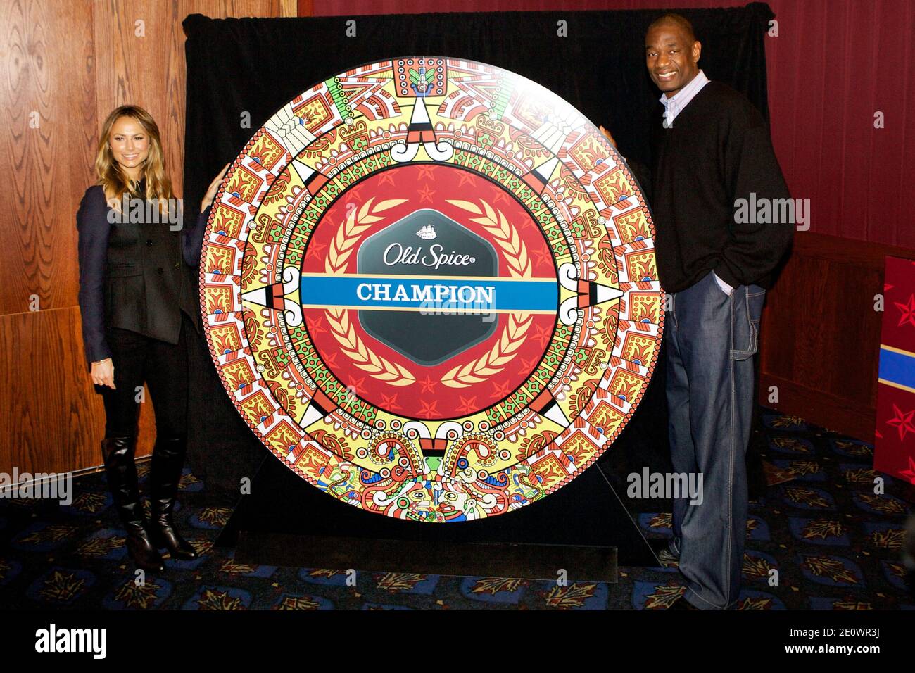 Stacy Keibler and NBA legend Dikembe Mutombo team up with Old Spicde to the launch of 'Save the World' video game in New York City, NY, USA on December 04, 2012. Photo by Matthew Borowick/ABACAPRESS.COM Stock Photo