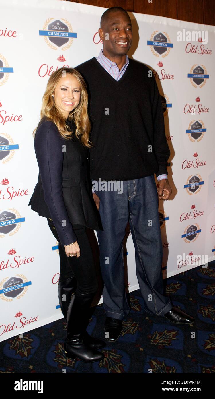 Stacy Keibler and NBA legend Dikembe Mutombo team up with Old Spicde to the launch of 'Save the World' video game in New York City, NY, USA on December 04, 2012. Photo by Matthew Borowick/ABACAPRESS.COM Stock Photo