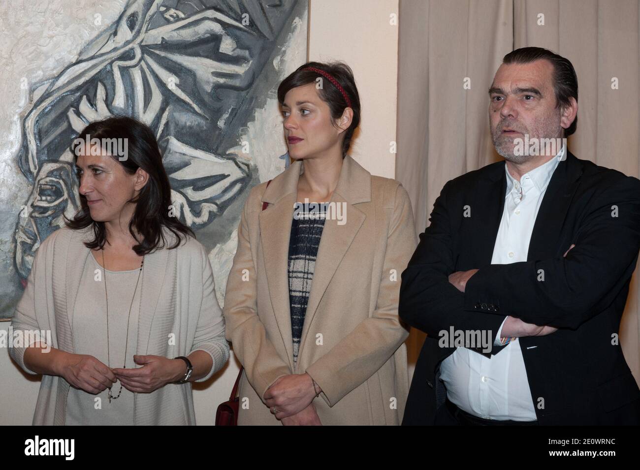 Florence Cassez's lawyer Franck Berton and Marion Cotillard attend an exhibition of Florence Cassez paintings, in Paris, France , on December 6, 2012. Photo by Christophe Guibbaud/ABACAPRESS.COM Stock Photo