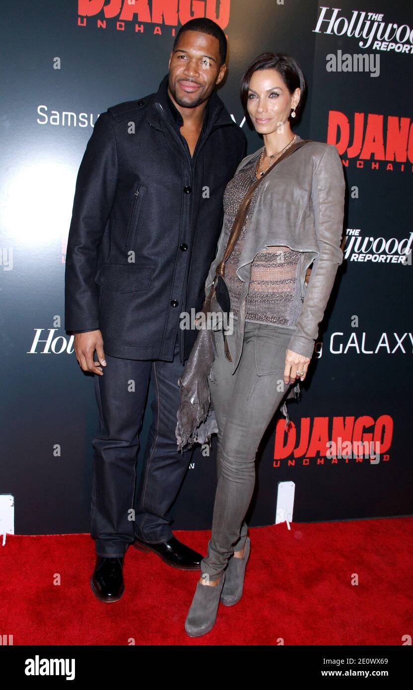 Michael Strahan and Nicole Murphy attend the premiere of 'Django