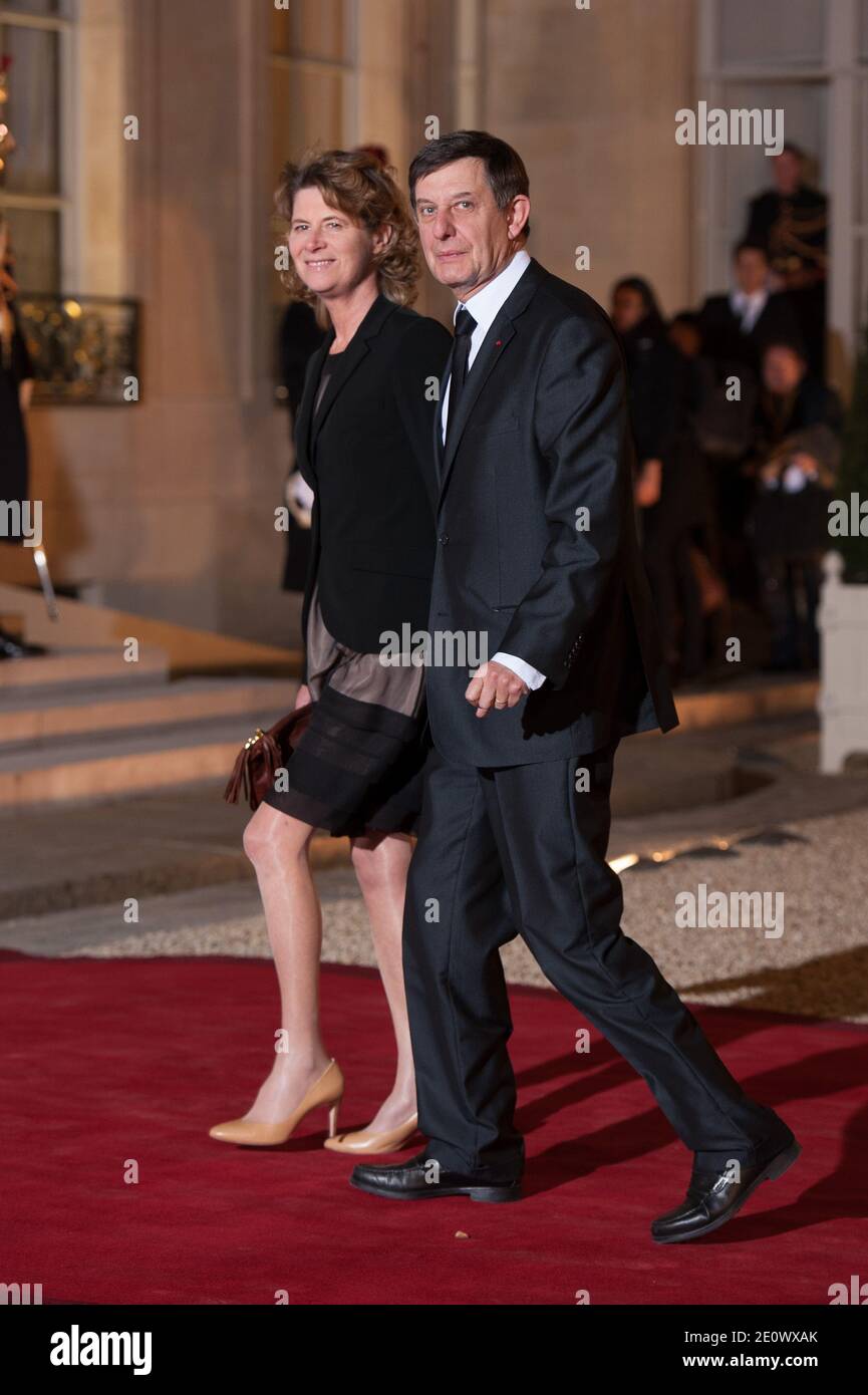 Jean Pierre Jouyet and his wife Brigitte Taittinger arrive at the Elysee  Palace to attend a state dinner given in honour of Brazil's President Dilma  Rousseff, in Paris, France, on December 11,