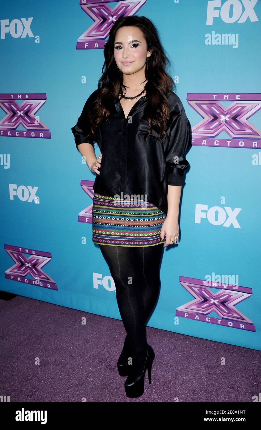 Demi Lovato attends Fox's 'The X Factor' season finale news conference at CBS Televison City in Los Angeles, CA, USA on December 17, 2012. She is wearing Topshop top and skirt and Yves Saint Laurent shoes. Photo by Lionel Hahn/ABACAPRESS.COM Stock Photo