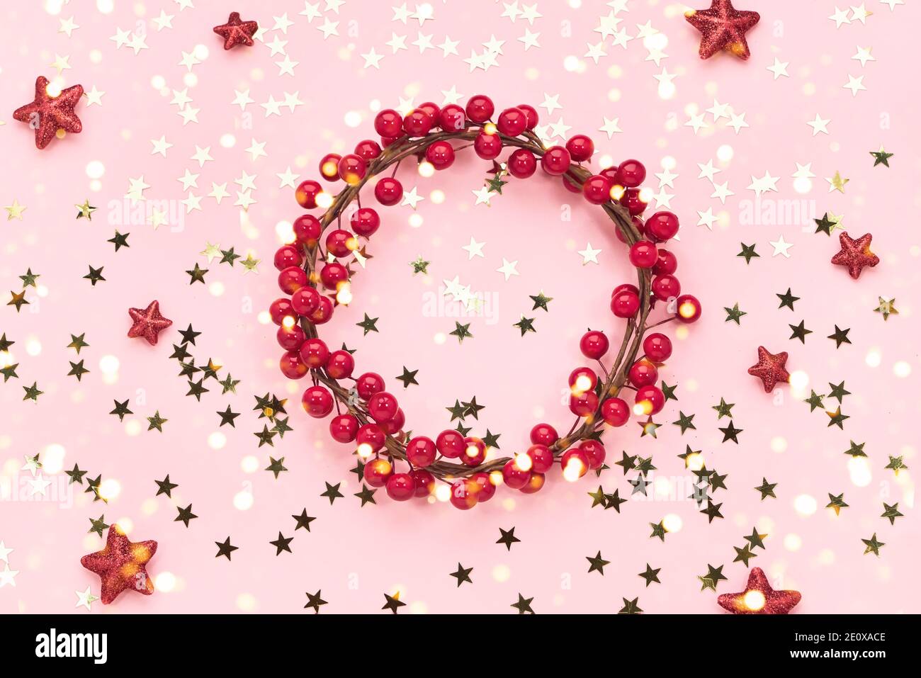 https://c8.alamy.com/comp/2E0XACE/christmas-background-red-christmas-decoration-on-pink-background-copy-space-2E0XACE.jpg