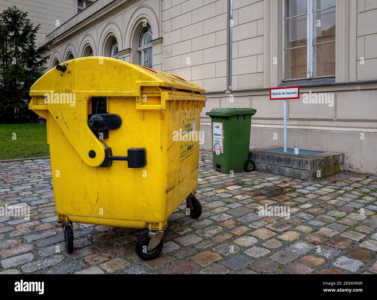 Yellow Trash Can Stock Photo Alamy