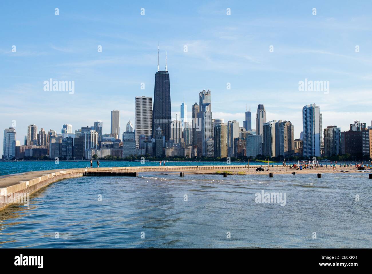 North Avenue Beach pier and seawall, Chicago skyline in background Stock Photo Alamy