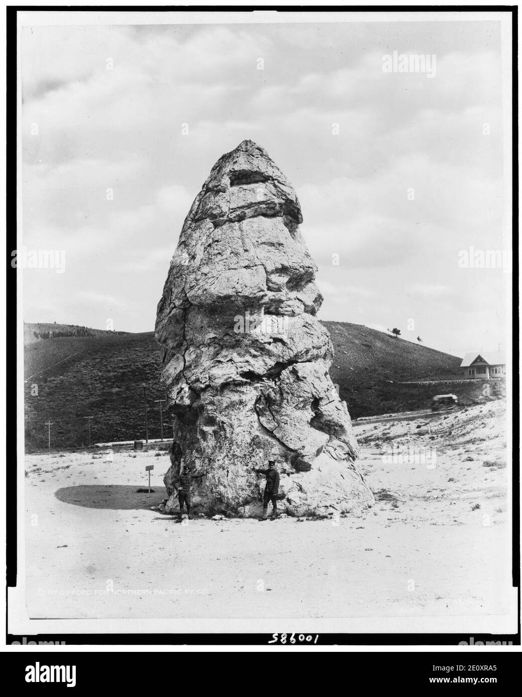 Liberty Cap at Mammoth Hot Springs, Yellowstone National Park, Wyoming, reached by the Northern Pacific Railway via Gardiner Gateway Stock Photo