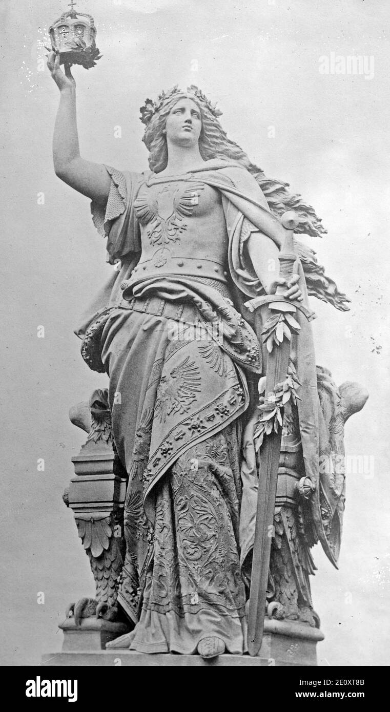 Figure on Niederwald monument - Photograph shows Germania figure on the Niederwalddenkmal, a monument constructed in 1871 to commemorate the foundation of the German Empire, located in the Niederwald landscape park, Hesse, Germany, circa 1920 Stock Photo