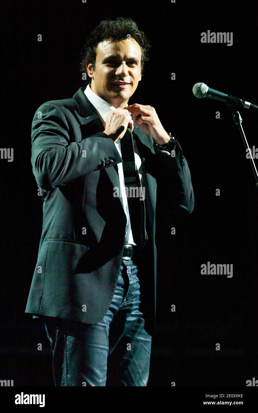 Australian-Italian tenor 'Alfio' (Alfio Bonanno) performing live in concert at Sydney Entertainment Centre in Sydney, Australia. He was the support on the night for the Italian songwriter Zucchero. Stock Photo