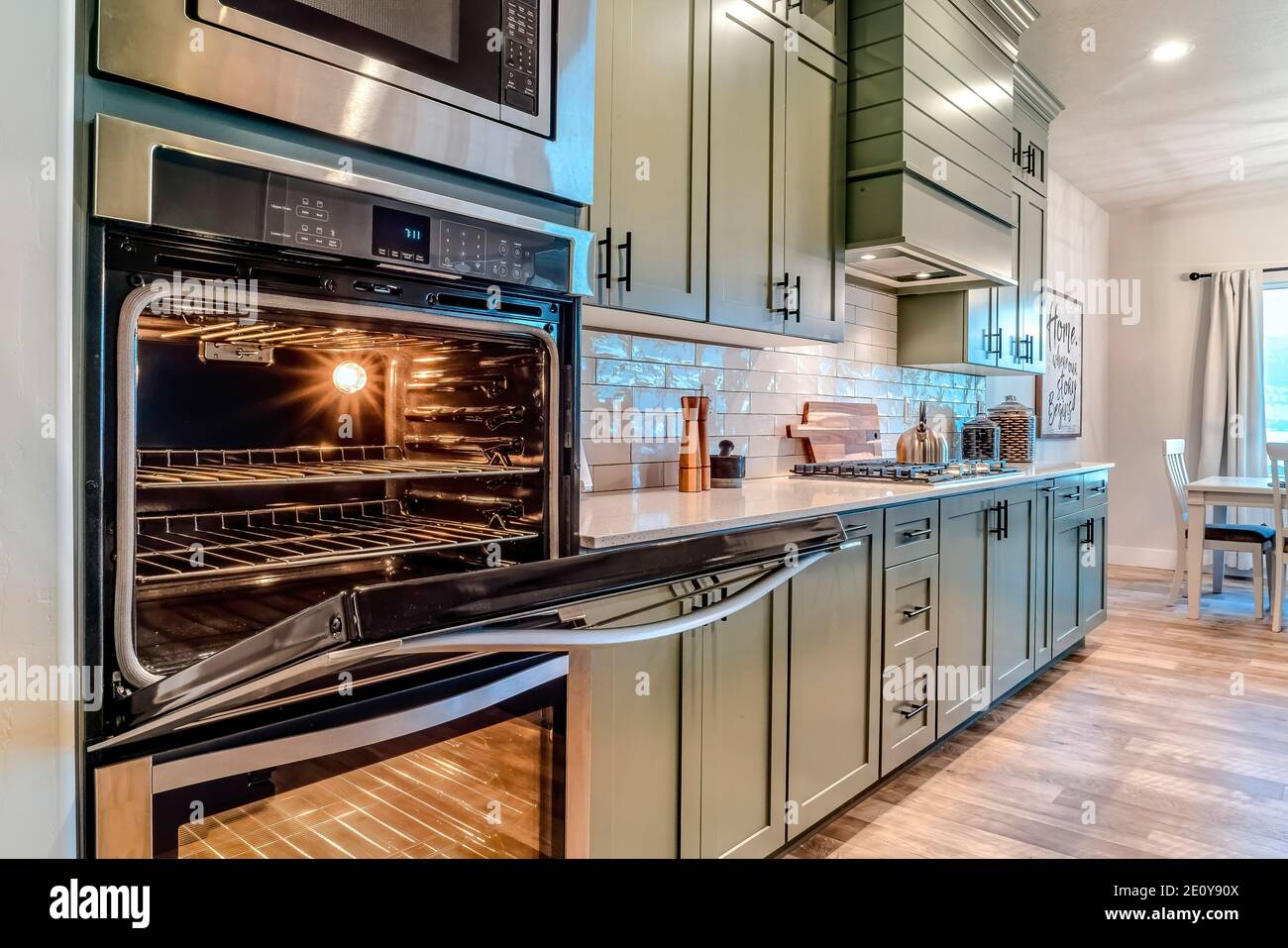 Electric oven and microwave inside a modern home kitchen with ...