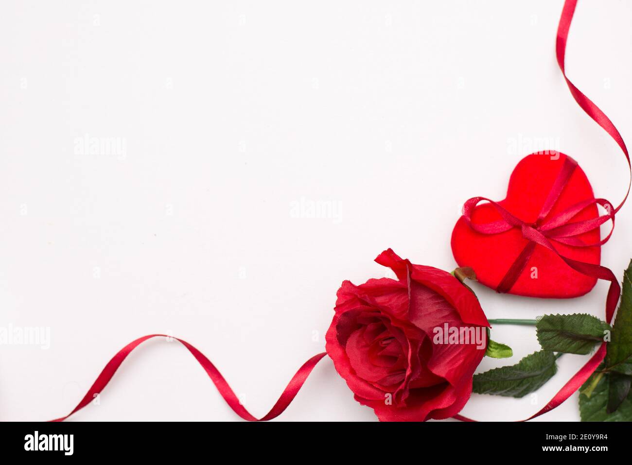 Heart with red rose isolated on white background Stock Photo - Alamy