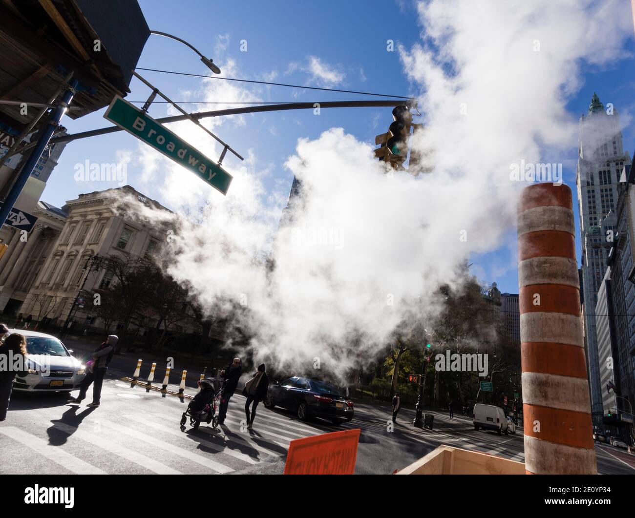 New York City, NY (USA) - 16 November 2019: Steam vapor is raising from the New York City steam systems at a corner of Broadway, NYC. Stock Photo
