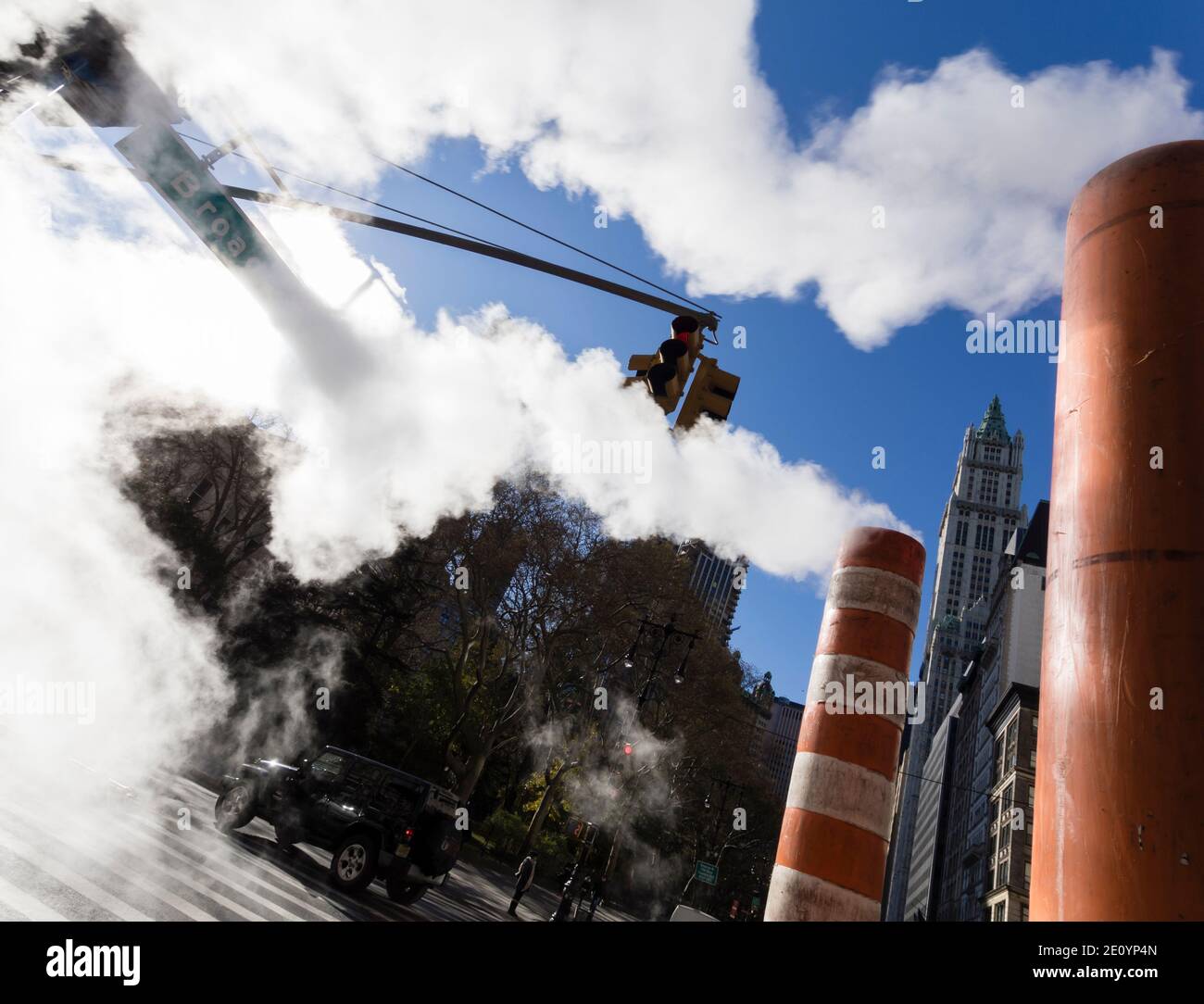 New York City, NY (USA) - 16 November 2019: Steam vapor is raising from the New York City steam systems at a corner of Broadway, NYC. Stock Photo