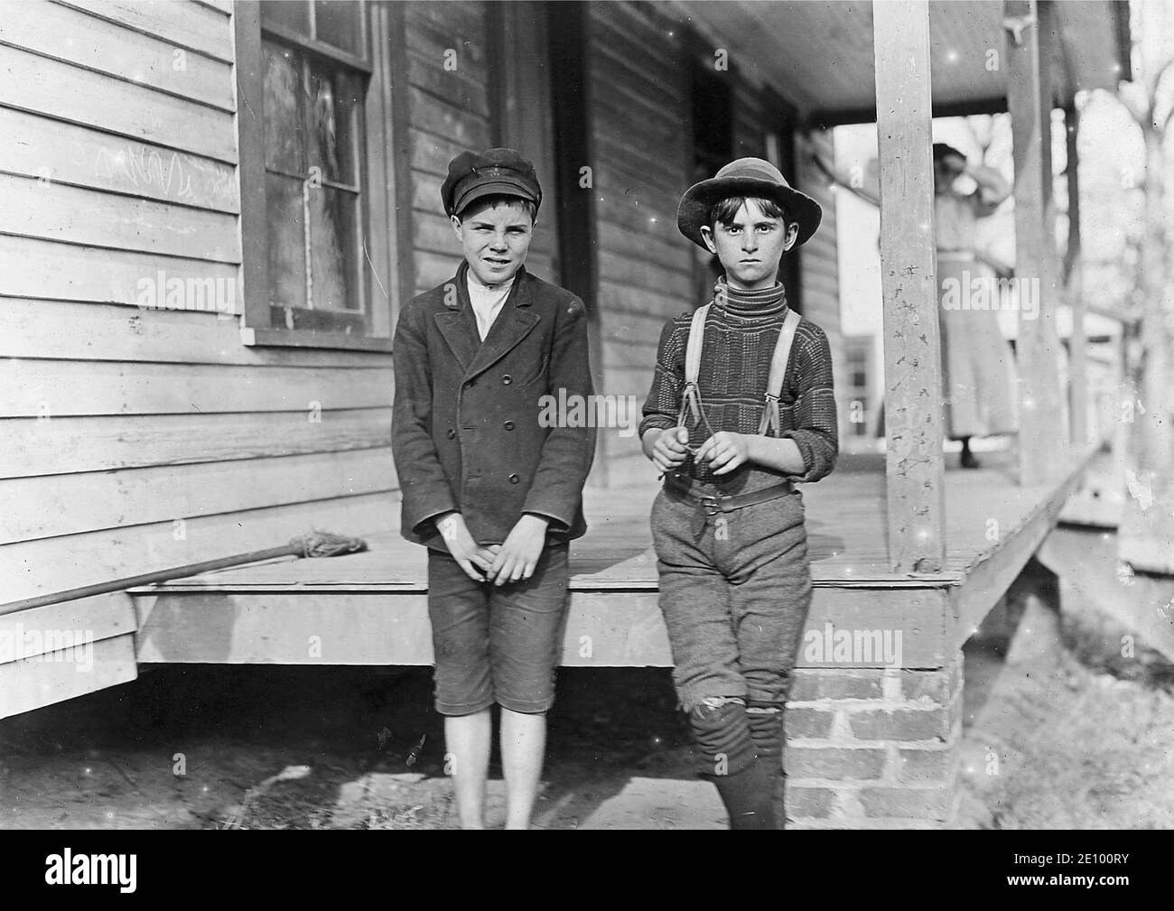 Vintage Lewis Hine photograph of two young mill workers . Stock Photo