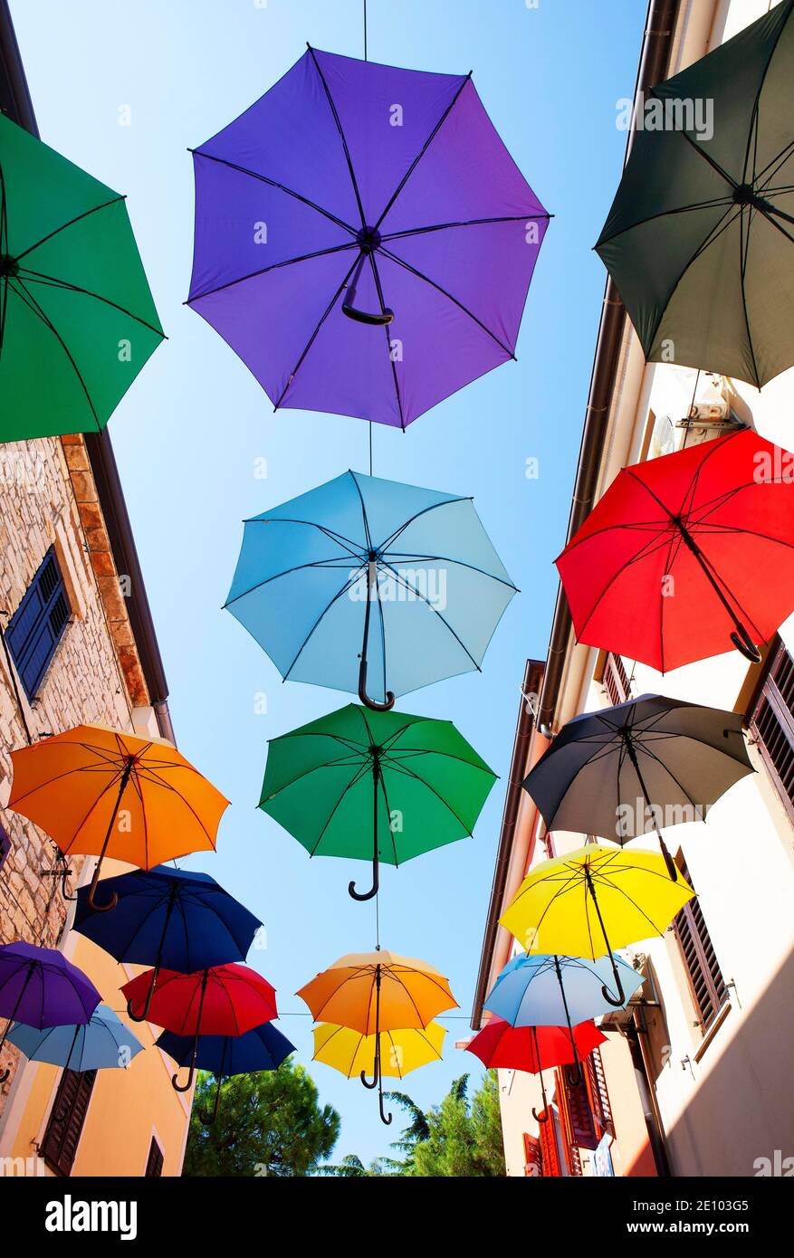 Colorful umbrellas as decoration in the old town, Novigrad, Adriatic coast, Istria, Croatia, Europe Stock Photo