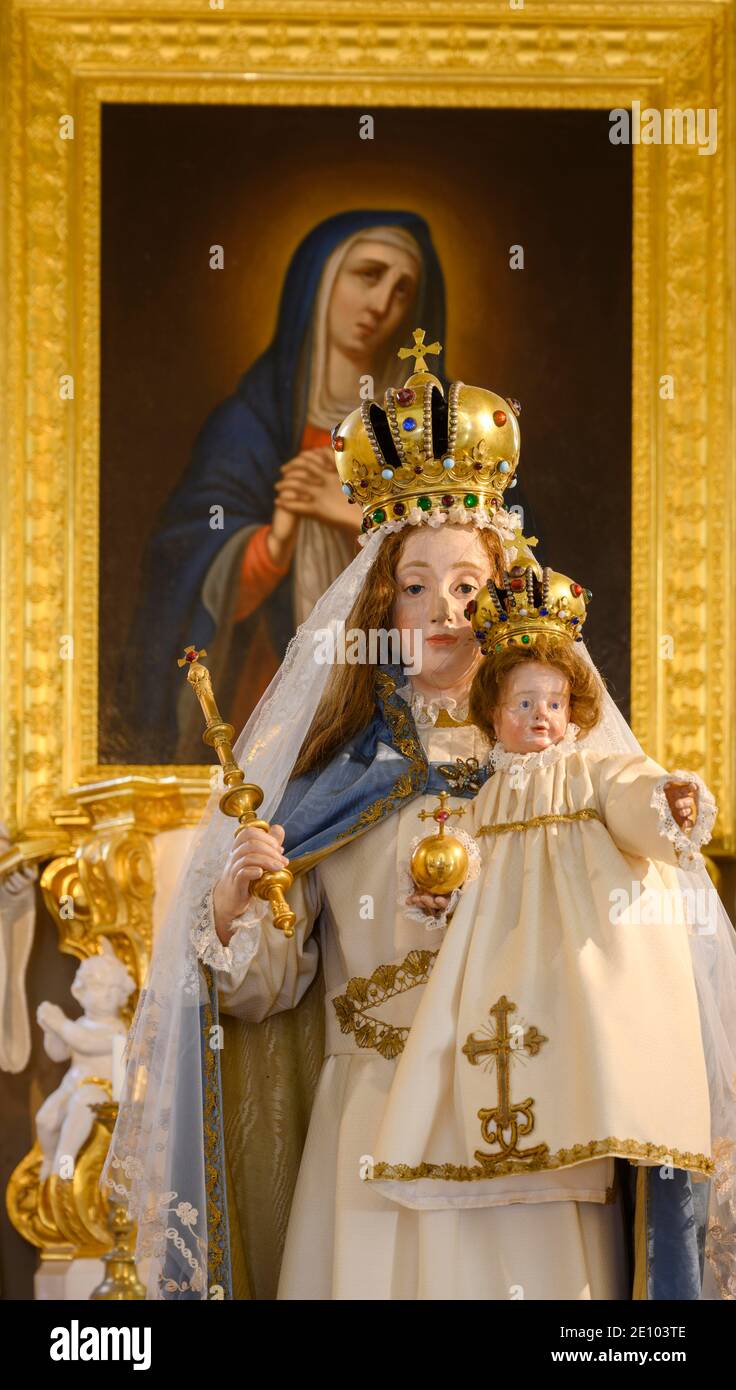 Statue of the Virgin Mary with infant Jesus and painting behind, Basilica  Mariazell in the Vienna Woods, Lower Austria, Austria, Europe Stock Photo -  Alamy