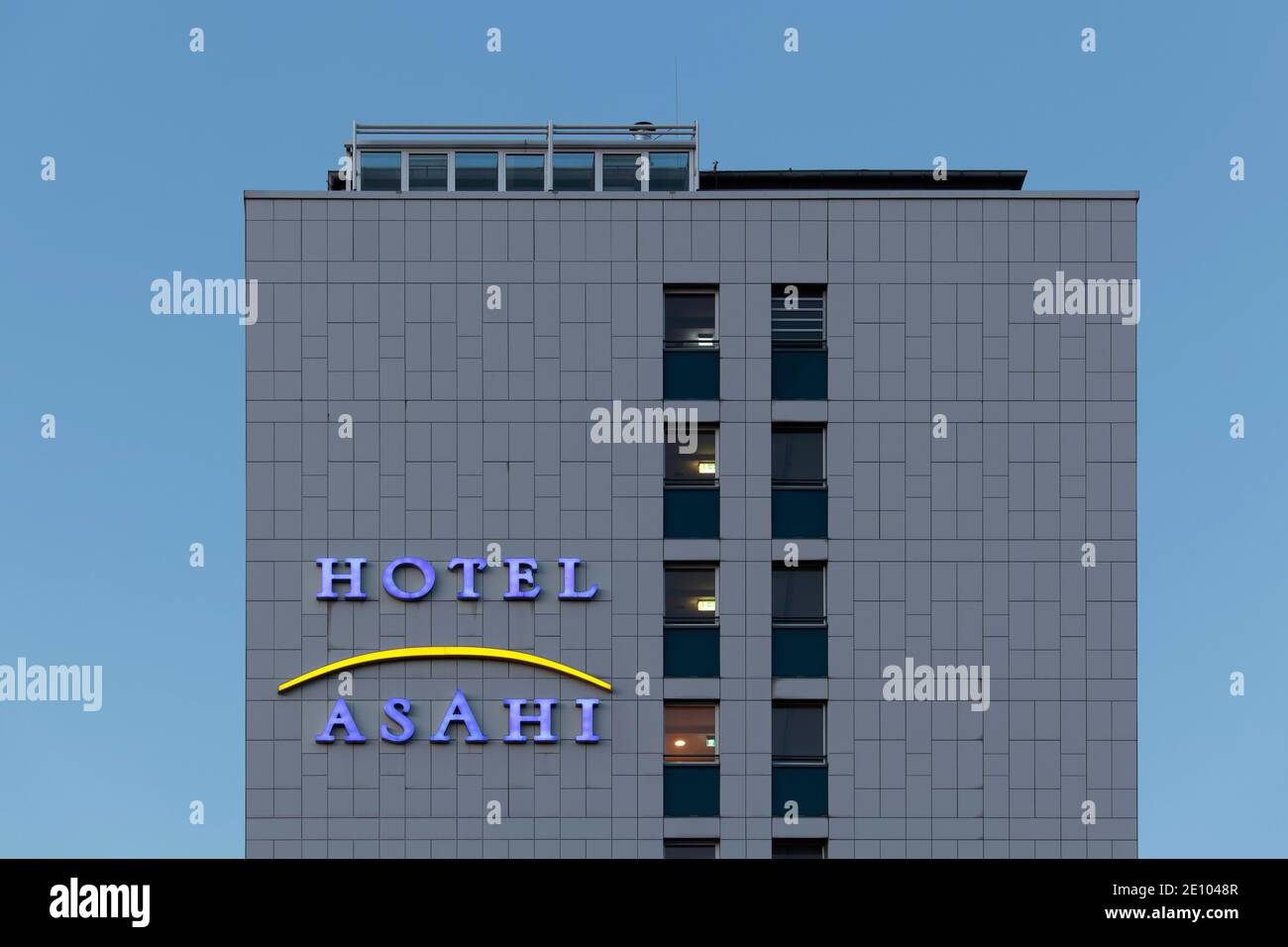 Asahi Hotel, illuminated lettering on the building, business hotel in the Japanese quarter of Düsseldorf, North Rhine-Westphalia, Germany, Europe Stock Photo