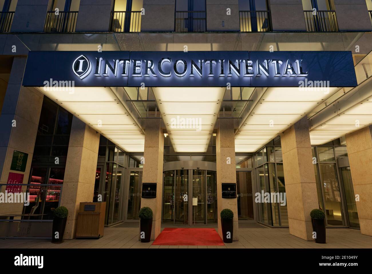 Hotel Intercontinental, illuminated entrance with logo, Königsallee, Düsseldorf, North Rhine-Westphalia, Germany, Europe Stock Photo