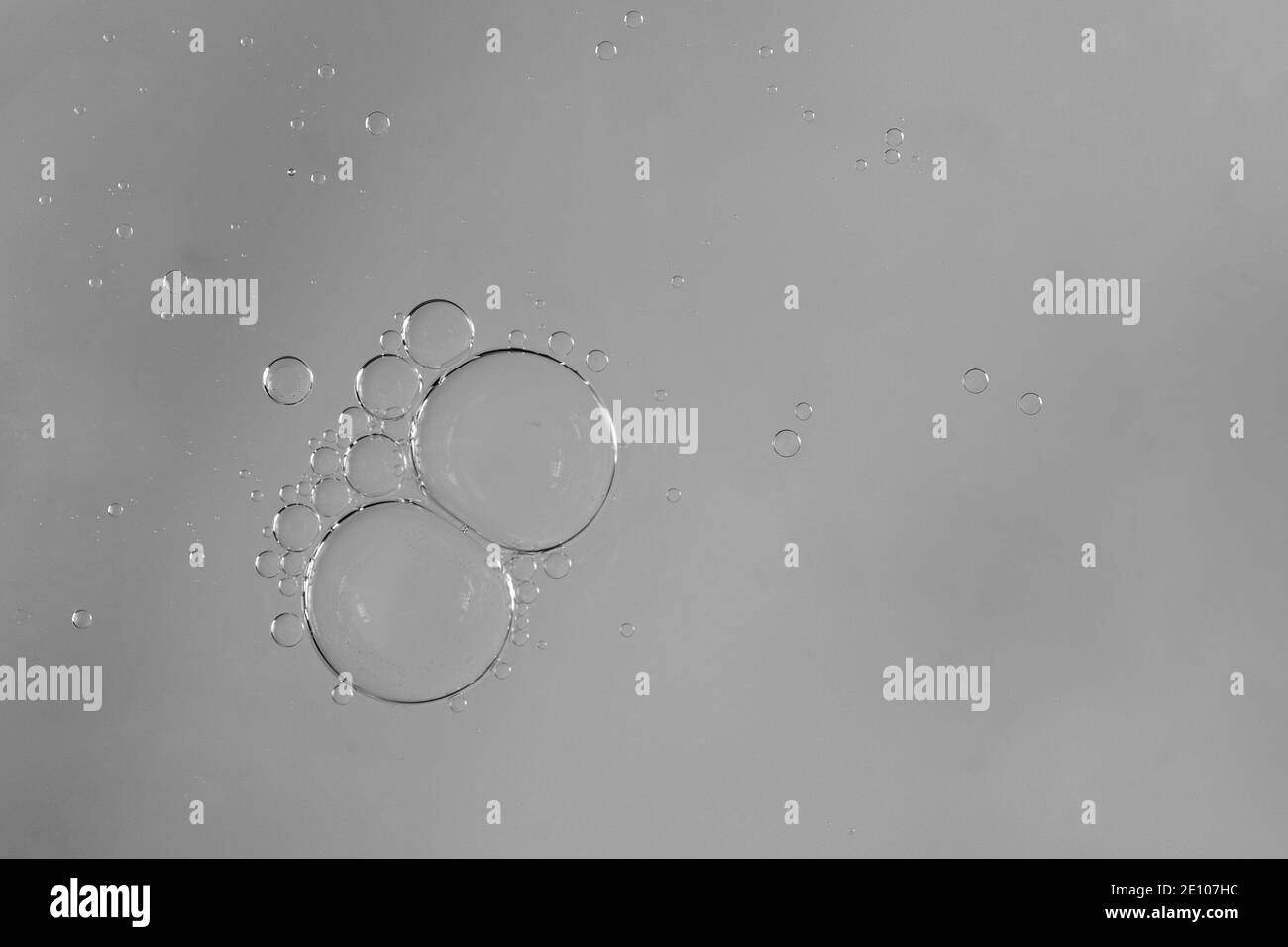 grease on the surface in the gray water Stock Photo Alamy