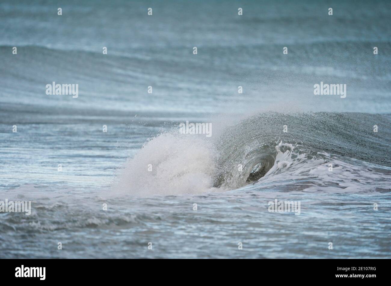 Breaking waves on coast in Spain, Andalusia, Spain. Stock Photo