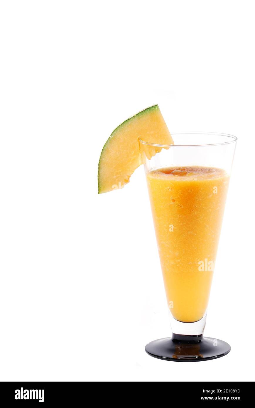 yellow juicy melons healthy ginger smoothie big closeup on white