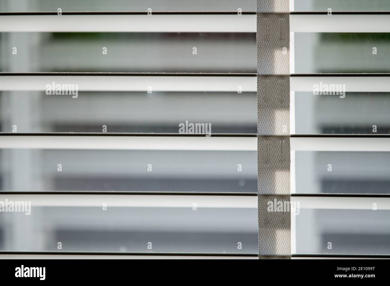 Close up of blinds on a window during the day. Stock Photo