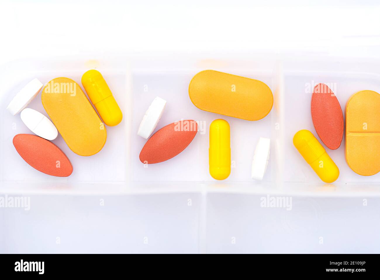 Yellow and red capsule hires stock photography and images Alamy