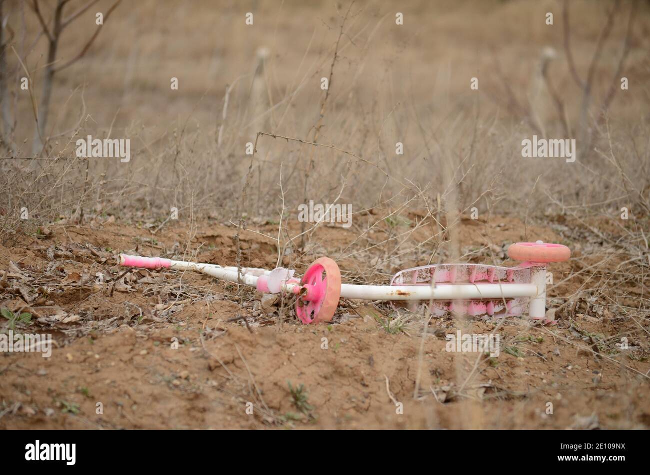 rusty old scooter standing on dirt ground Stock Photo - Alamy