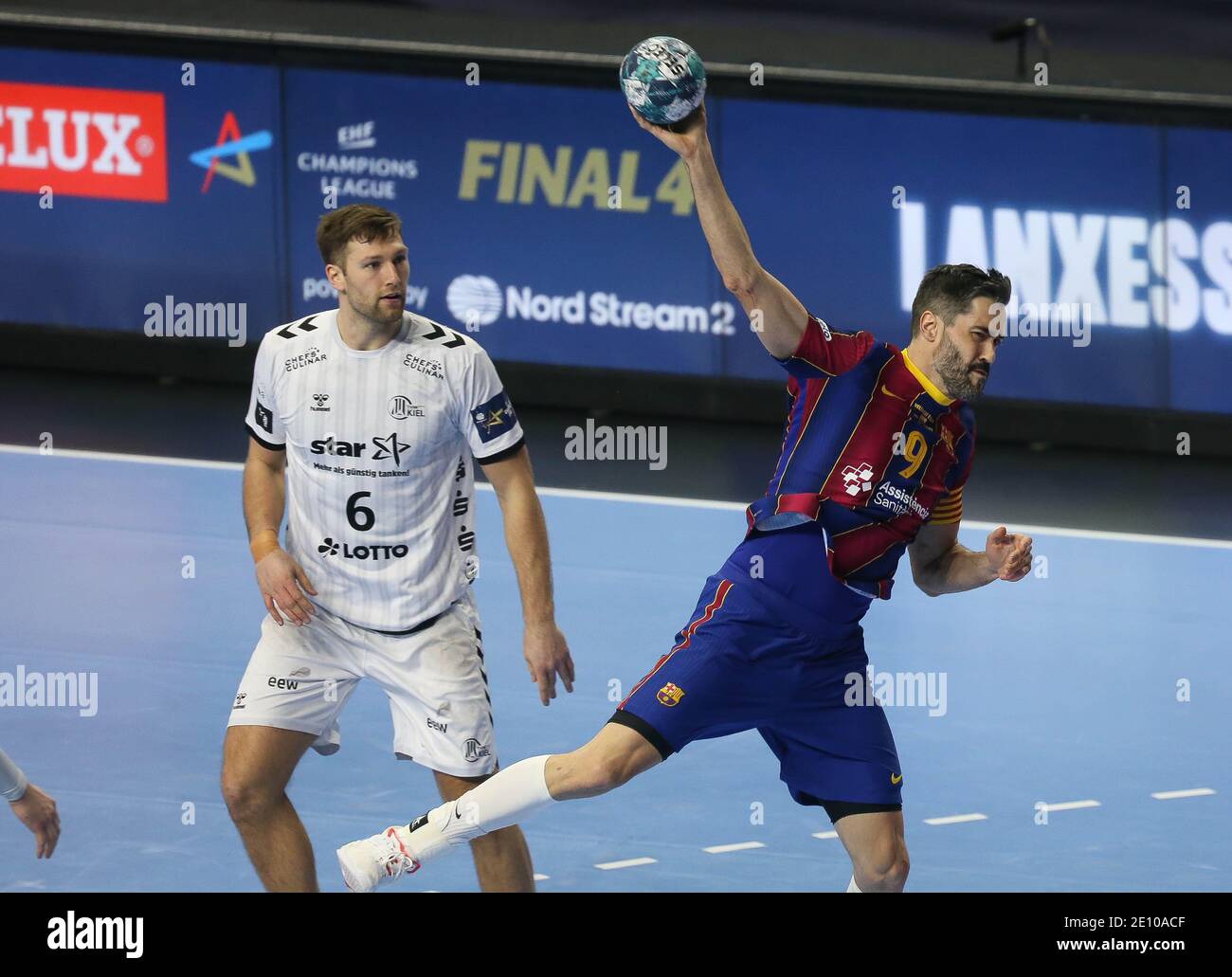 Harald Reinkind of THW Kiel and Raul Entrerrios Rodriguez of FC Barcelone during the EHF Champions League, Final Four, Final handball match between THW Kiel and FC Barcelona on December 29, 2020