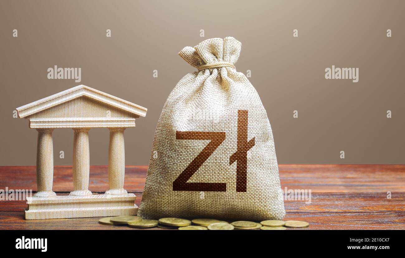 Polish zloty money bag and bank / government building. Tax collection and budgeting. Lending loans, deposits. State debt. GDP and GNP. Monetary policy Stock Photo