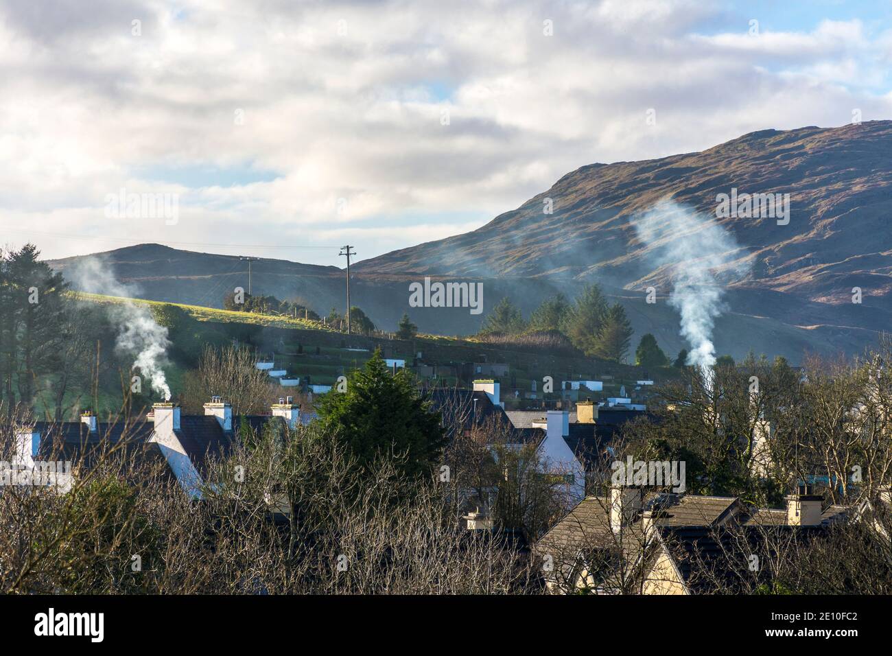 Homes burning coal, turf or wood for heating in rural Ireland. Ardara, County Donegal. Stock Photo