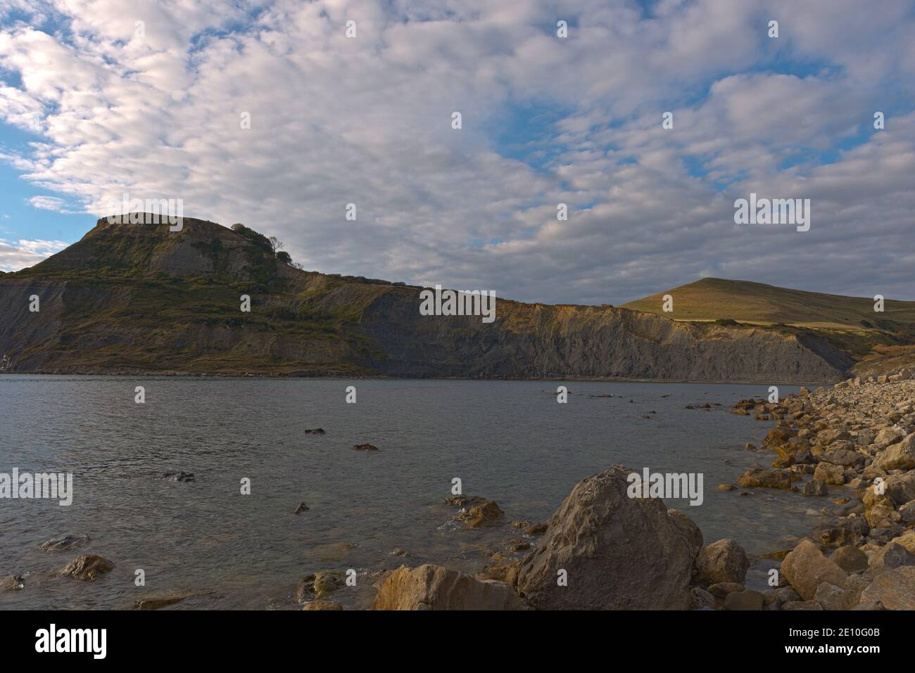 Landscape view across Chapmans Pool looking towards Egmont Point and Houns-tout Cliff on the Jurassic Coast on the Dorset Coast, England. Stock Photo