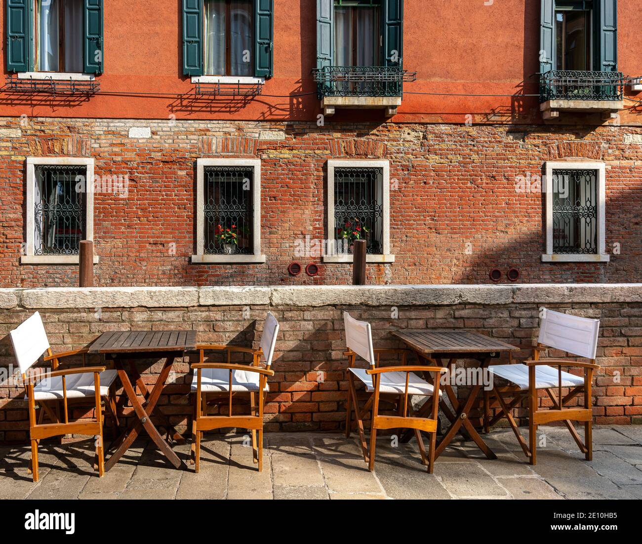 Tables And Chairs At The Restaurant In Venice Stock Photo