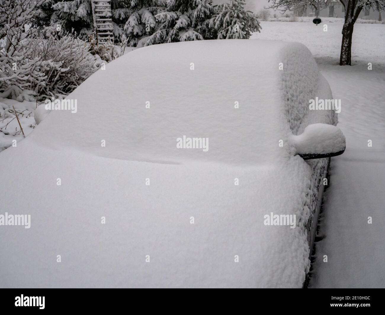 Car is completely covered with snow Stock Photo