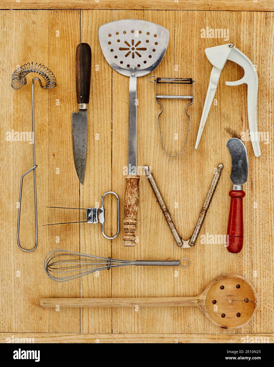 Old Kitchen Implements on Cutting Board 1 Stock Photo Alamy